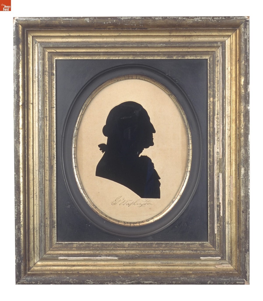 Black silhouette of person's head and shoulders, oval-matted and in ribbed gold frame