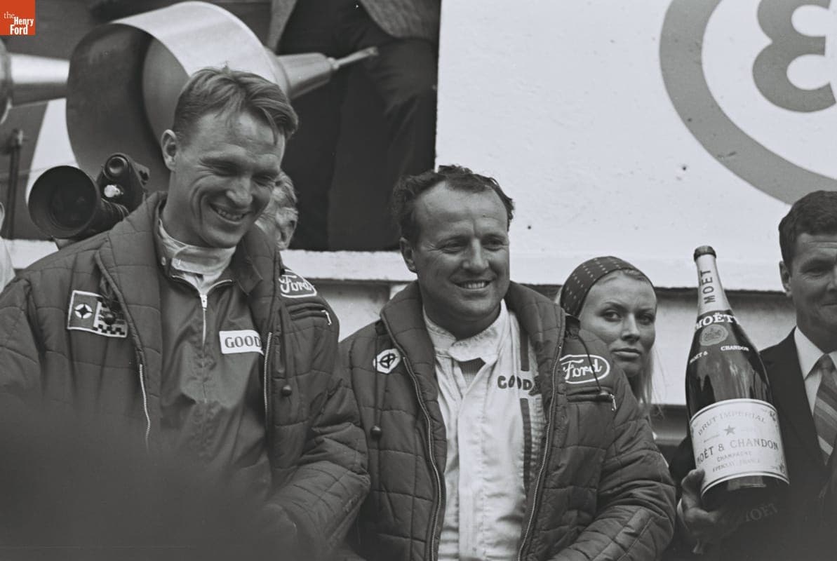 Dan Gurney and A. J. Foyt Celebrating Victory at the 24 Heures du Mans (24 Hours of Le Mans) Race, June 1967