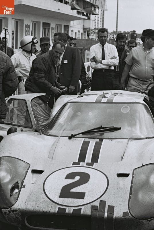 Carroll Shelby and Crew Working on Ford Mark IV Driven by Bruce McLaren and Mark Donohue at the 24 Heures du Mans (24 Hours of Le Mans) Race, June 1967
