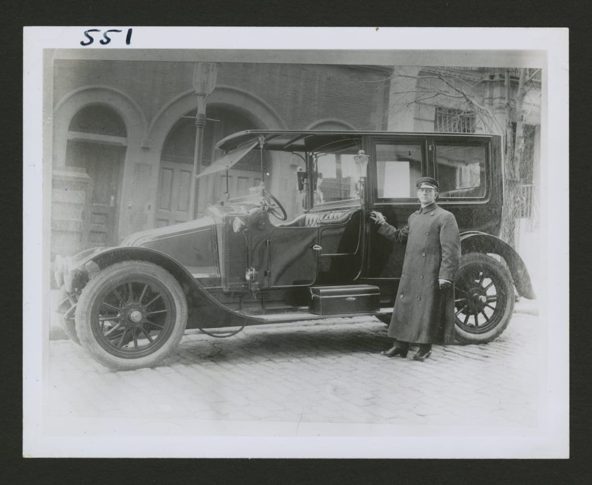 Chauffeur with 1914 Renault Limousine