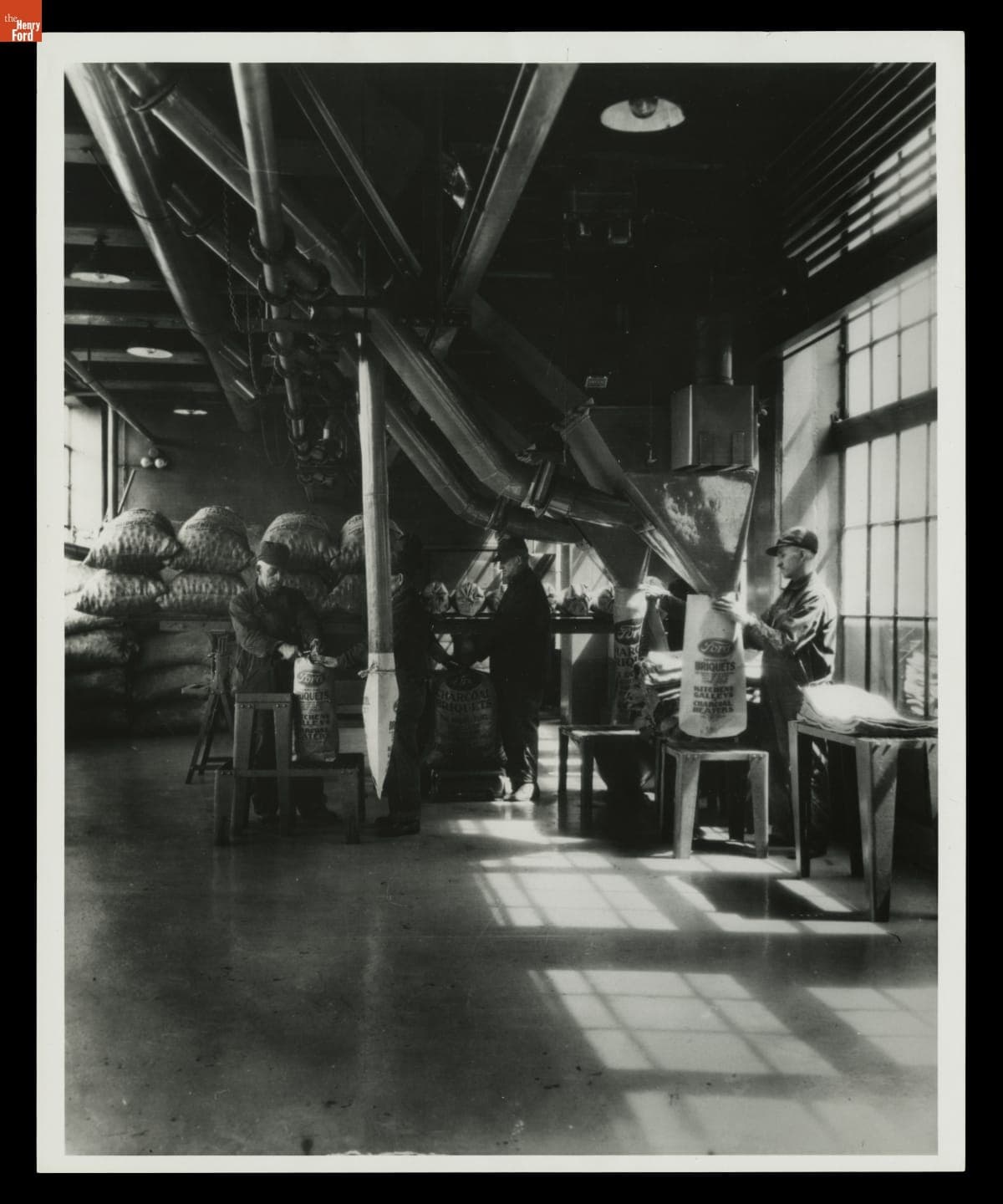 Bagging Charcoal Briquets at Ford Motor Company Iron Mountain Plant, 1935