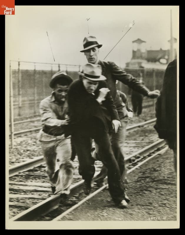 Ford Service Department Men Chase Union Official Robert Sentman during the Battle of the Overpass, May 26, 1937