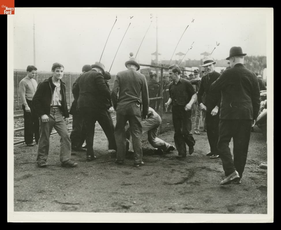 UAW Organizer is Beaten by Ford Service Department Men during the Battle of the Overpass, May 26, 1937
