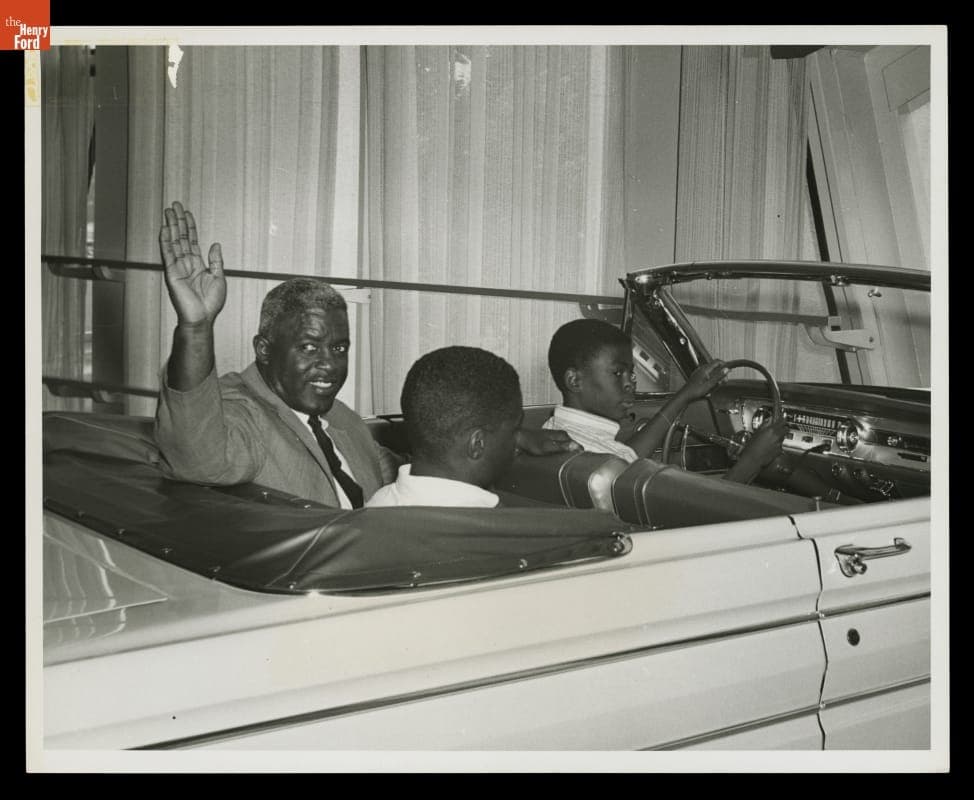 Jackie Robinson and Sons in a Ford Convertible on the Magic Skyway Ride, Ford Pavilion, New York World's Fair, 1964-1965