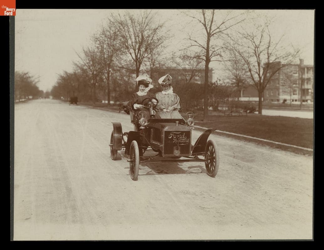 Myrle Clarkson Driving a 1906 Ford Model N with Clara Ford as Passenger
