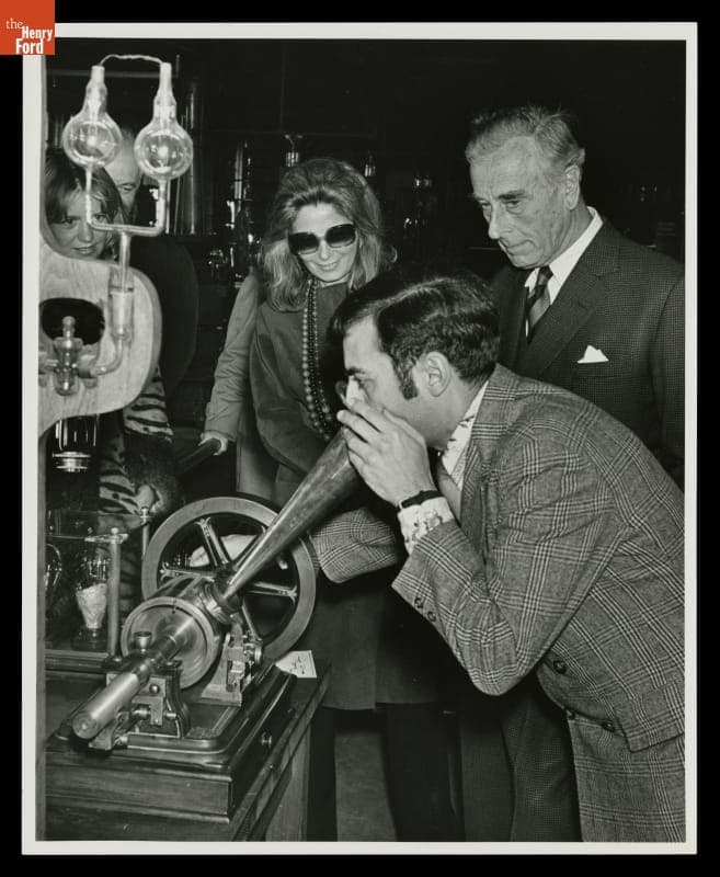 Curator Robert Koolakian with Lord Mountbatten and Group in Menlo Park Laboratory, Greenfield Village, April 8, 1972