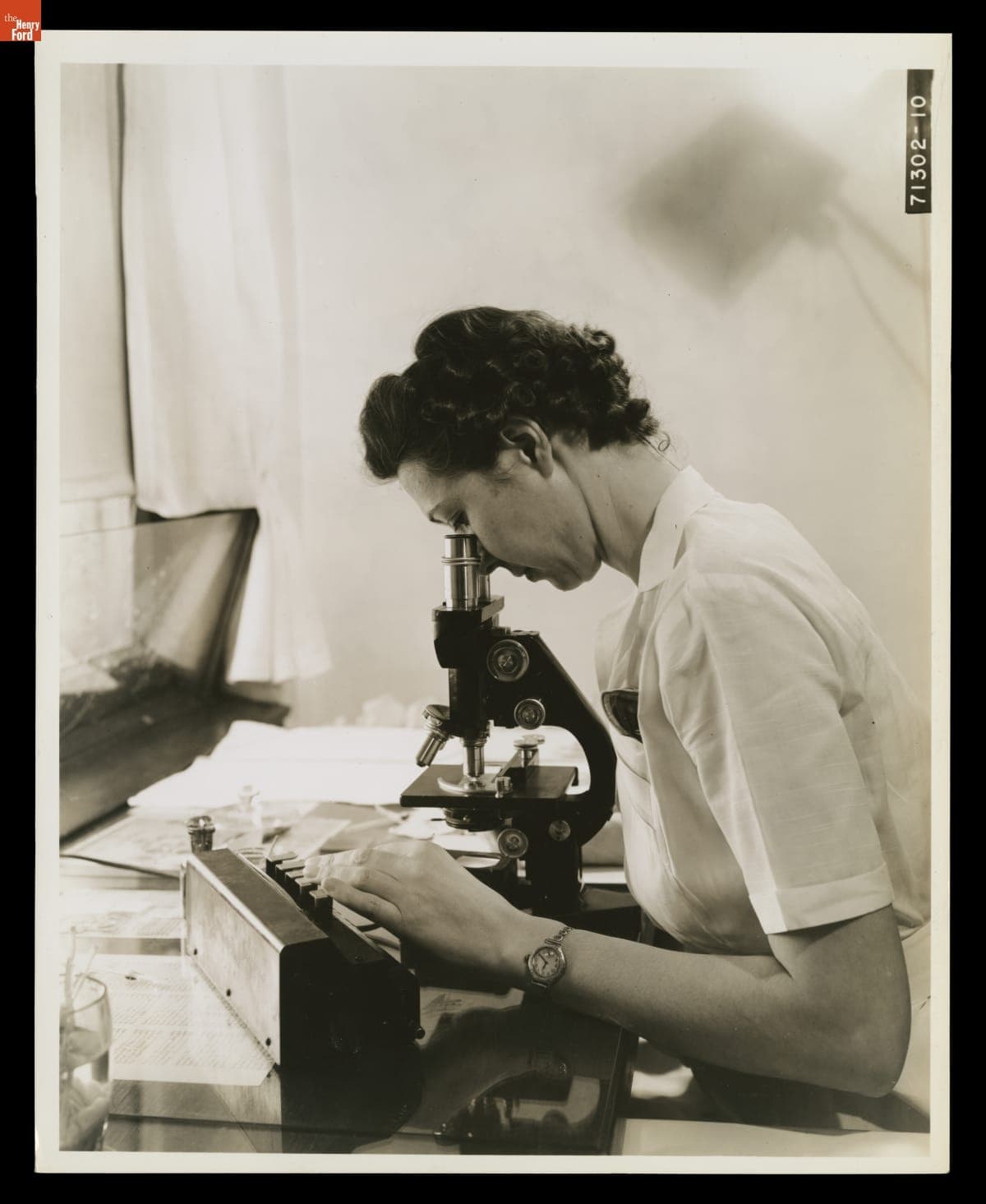 Woman Using a Research Laboratory Microscope at Henry Ford Hospital, Detroit, Michigan, January 1939