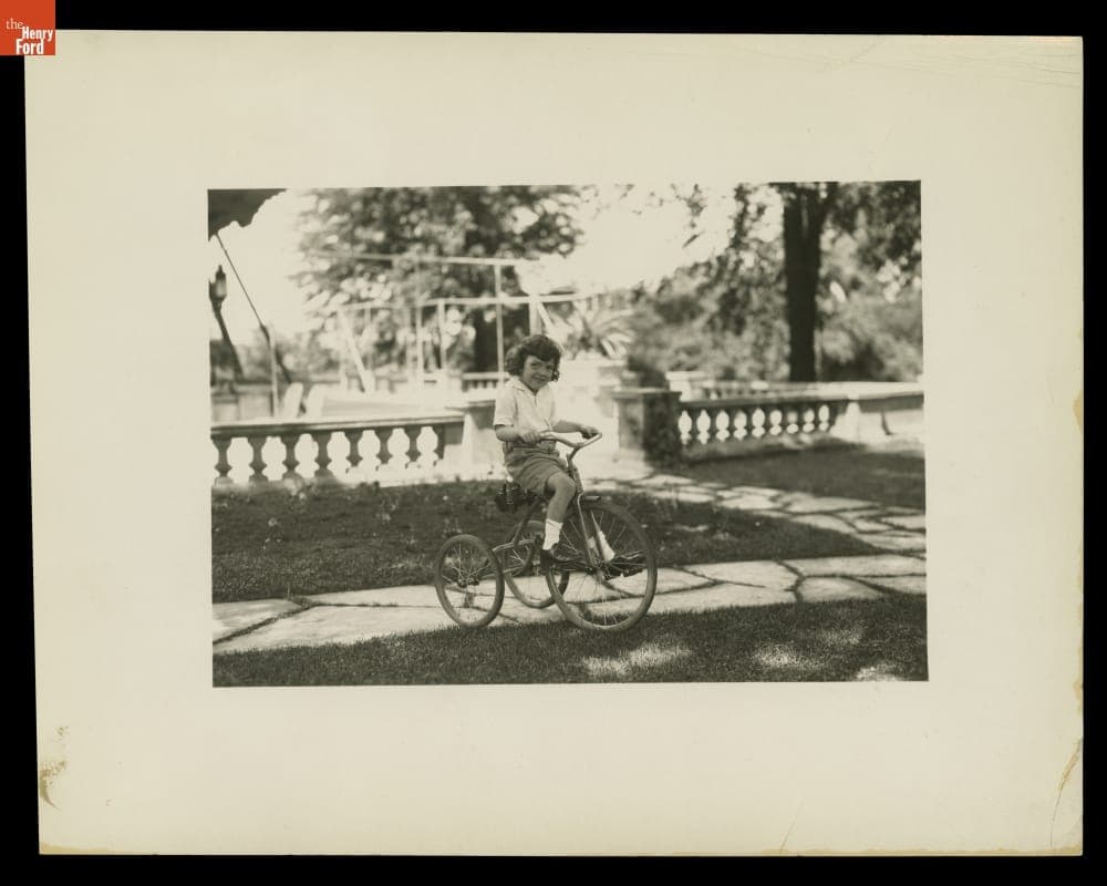 William Clay Ford, Age 4, Riding a Tricycle at Fair Lane, June 1929