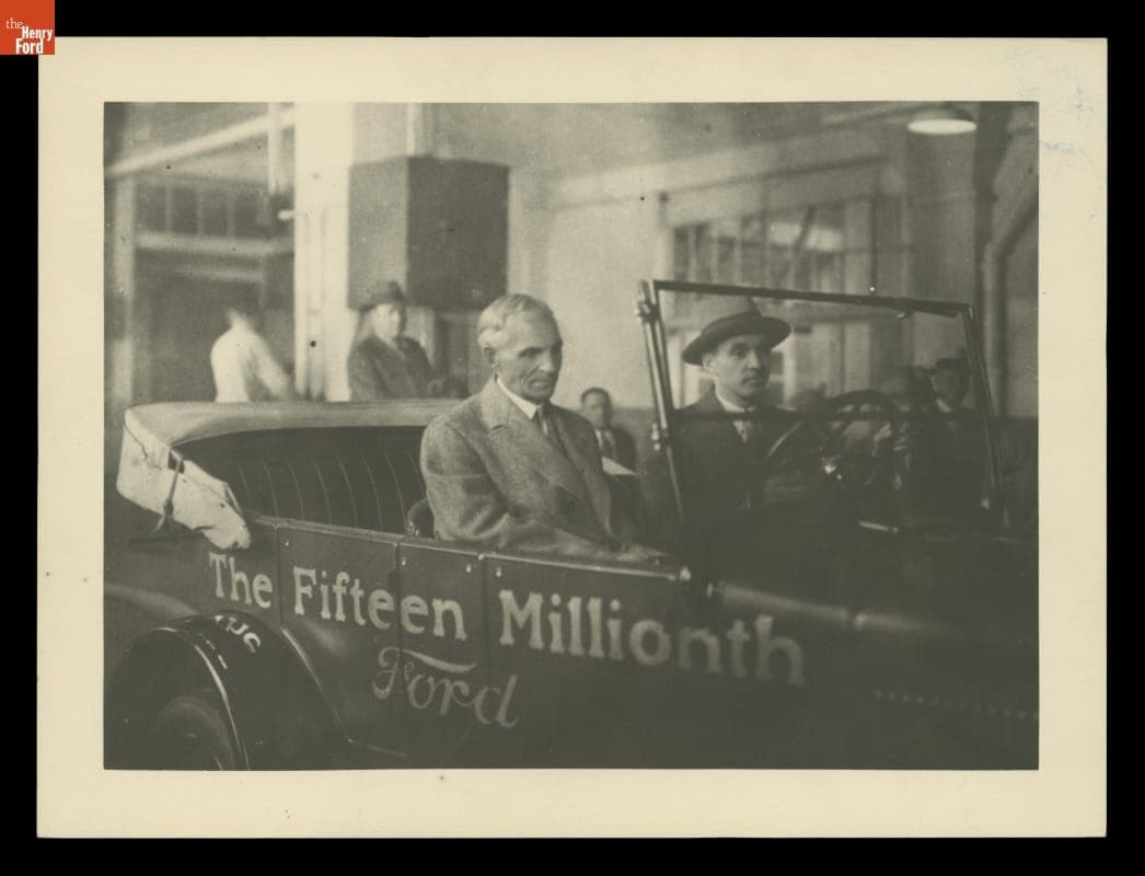 Henry Ford and Edsel Ford in the Fifteen Millionth Ford Car at the Highland Park Plant, 1927