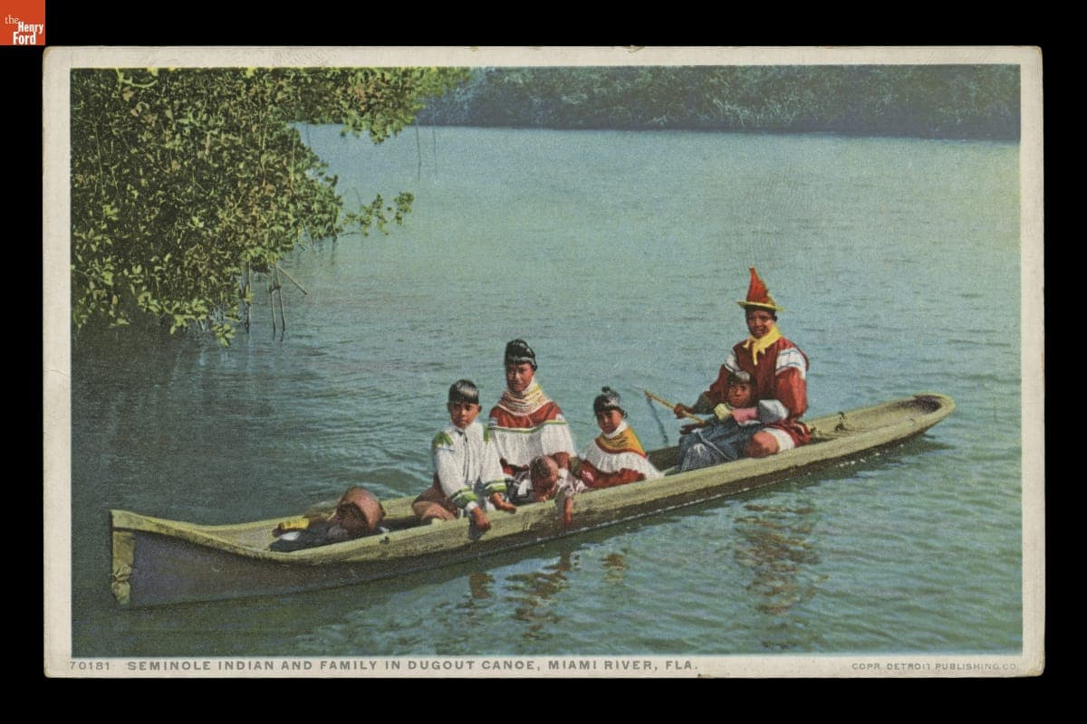 "Seminole Indian Family in Dugout Canoe, Miami River, Florida," circa 1911
