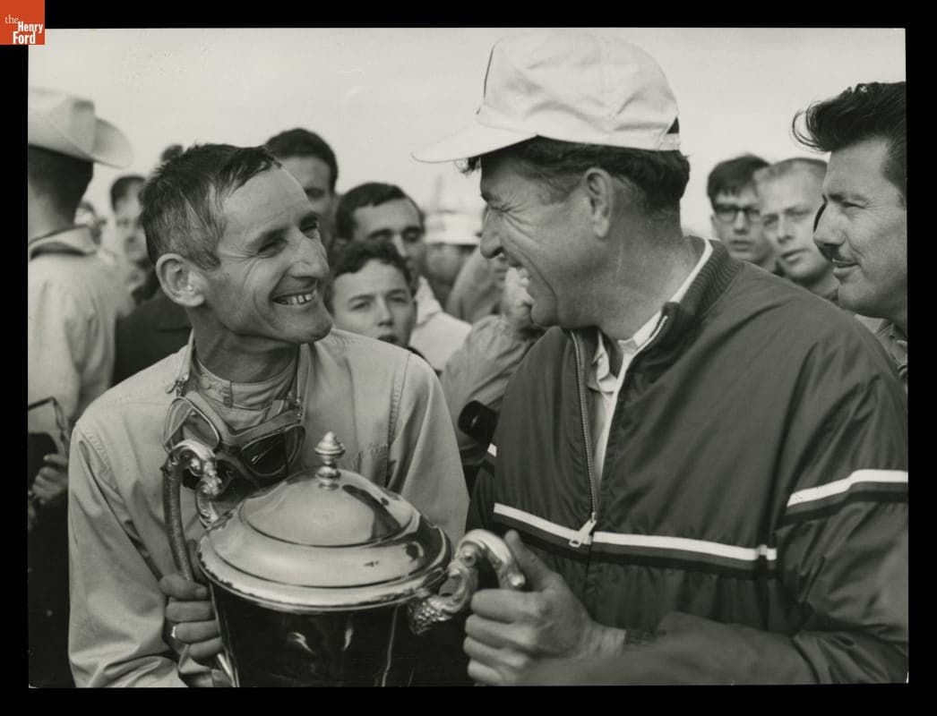 Carroll Shelby and Ken Miles Holding Trophy, Winner in Bridgehampton 500 Race, 1964