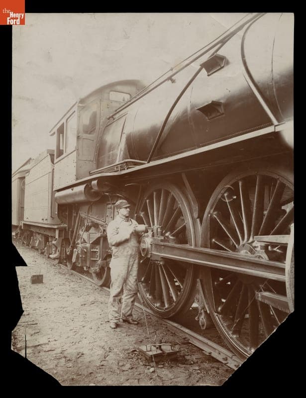 "Oiling Up Before the Start," Engineer Working on Michigan Central Railroad K Class Locomotive, circa 1905