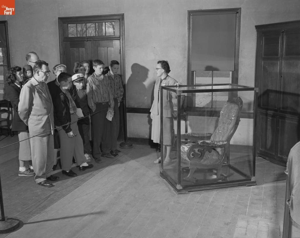 Guide Virginia Cook Presenting the Abraham Lincoln Chair, Then on Exhibit in Greenfield Village, April 1955