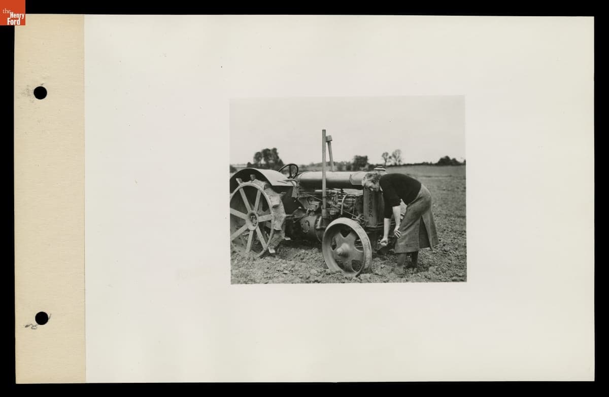Woman Starting a Tractor at Henry Ford Institute of Agricultural Engineering, England, 1939