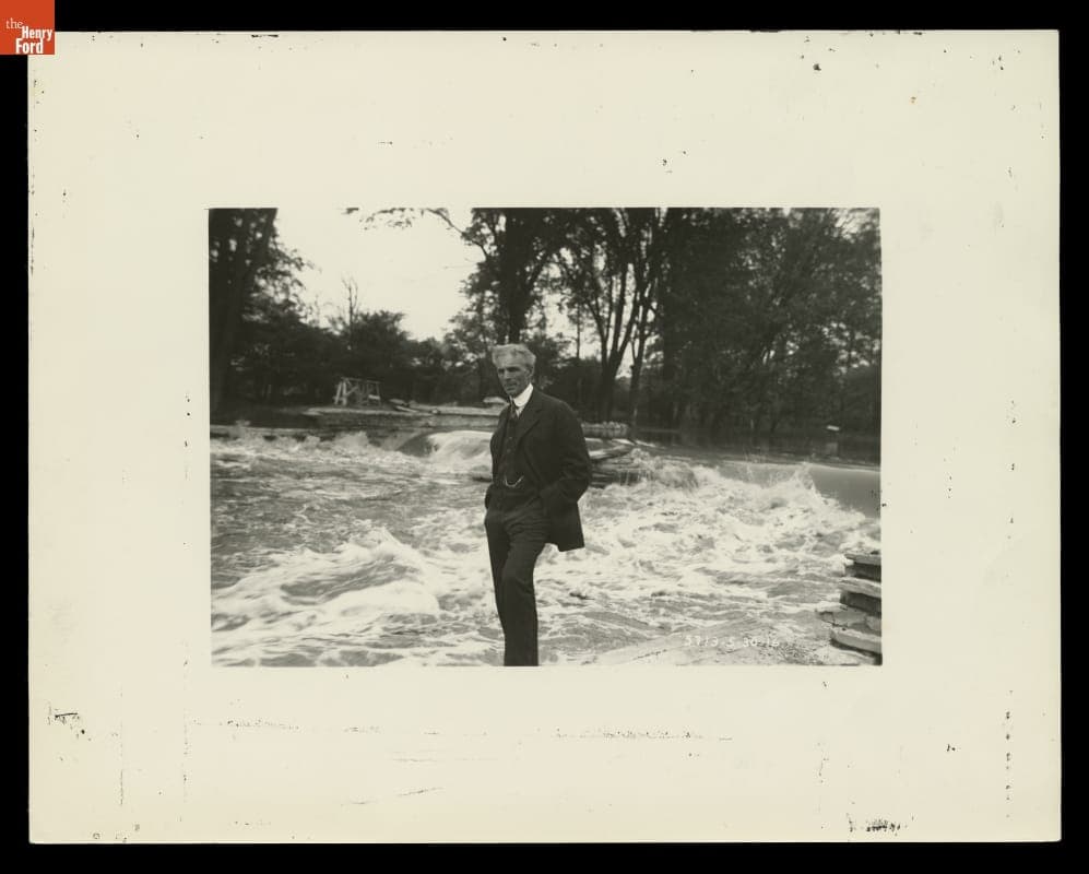 Henry Ford Standing by the Rouge River at Fair Lane, Dearborn, Michigan, 1916