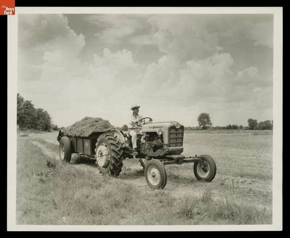 Ford Powermaster Tractor Towing a Large Manure Spreader, 1957