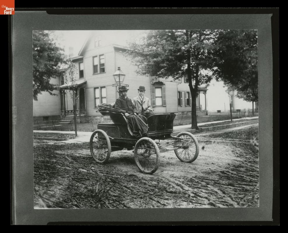 Alexander Winton and Mr. Shanks in an 1898 Winton Roadster
