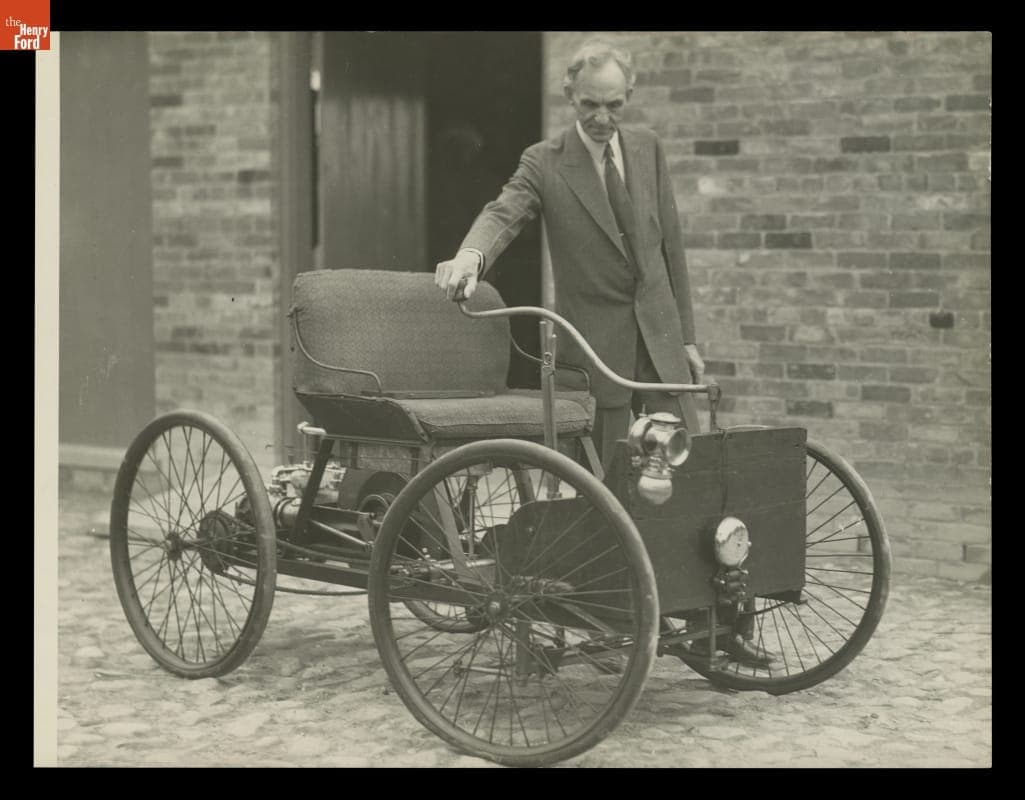 Henry Ford with 1896 Quadricycle at Bagley Avenue Workshop in Greenfield Village, June 16, 1933
