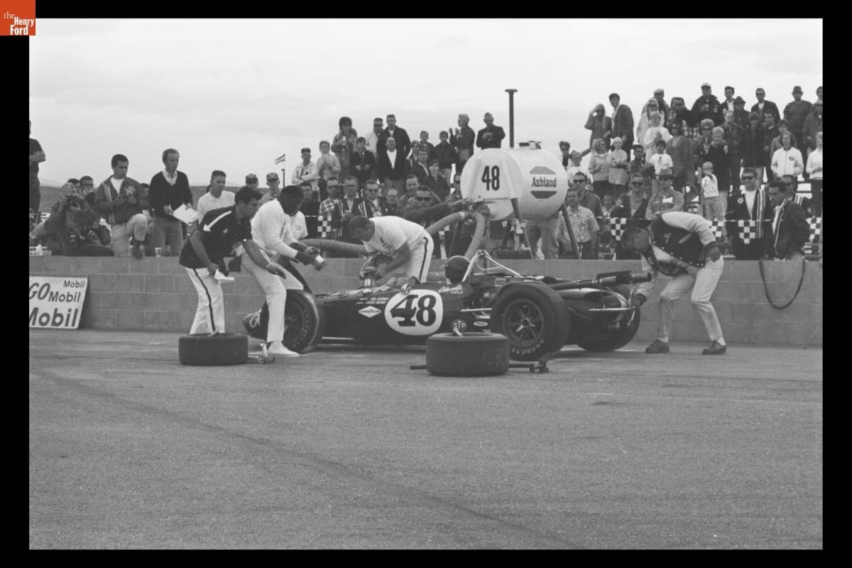 Dan Gurney Making Pit Stop in Eagle/Ford Race Car at Rex Mays Riverside 300, November 1967