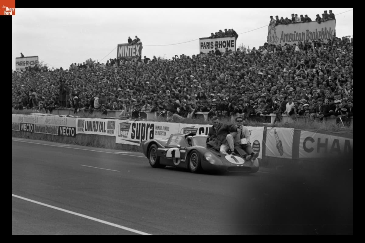 Dan Gurney and A. J. Foyt Celebrating Victory at the 24 Heures du Mans (24 Hours of Le Mans) Race, June 1967