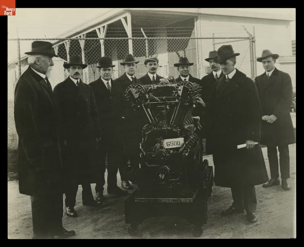 Henry Leland and a Group of Men Posing with the 6,500th Lincoln Liberty Engine, 1918