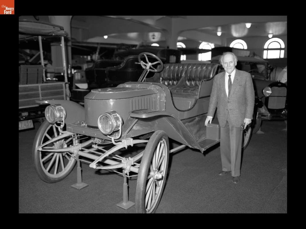 Yehudi Menuhin with 1910 Stanley Steamer in Henry Ford Museum, April 7, 1988