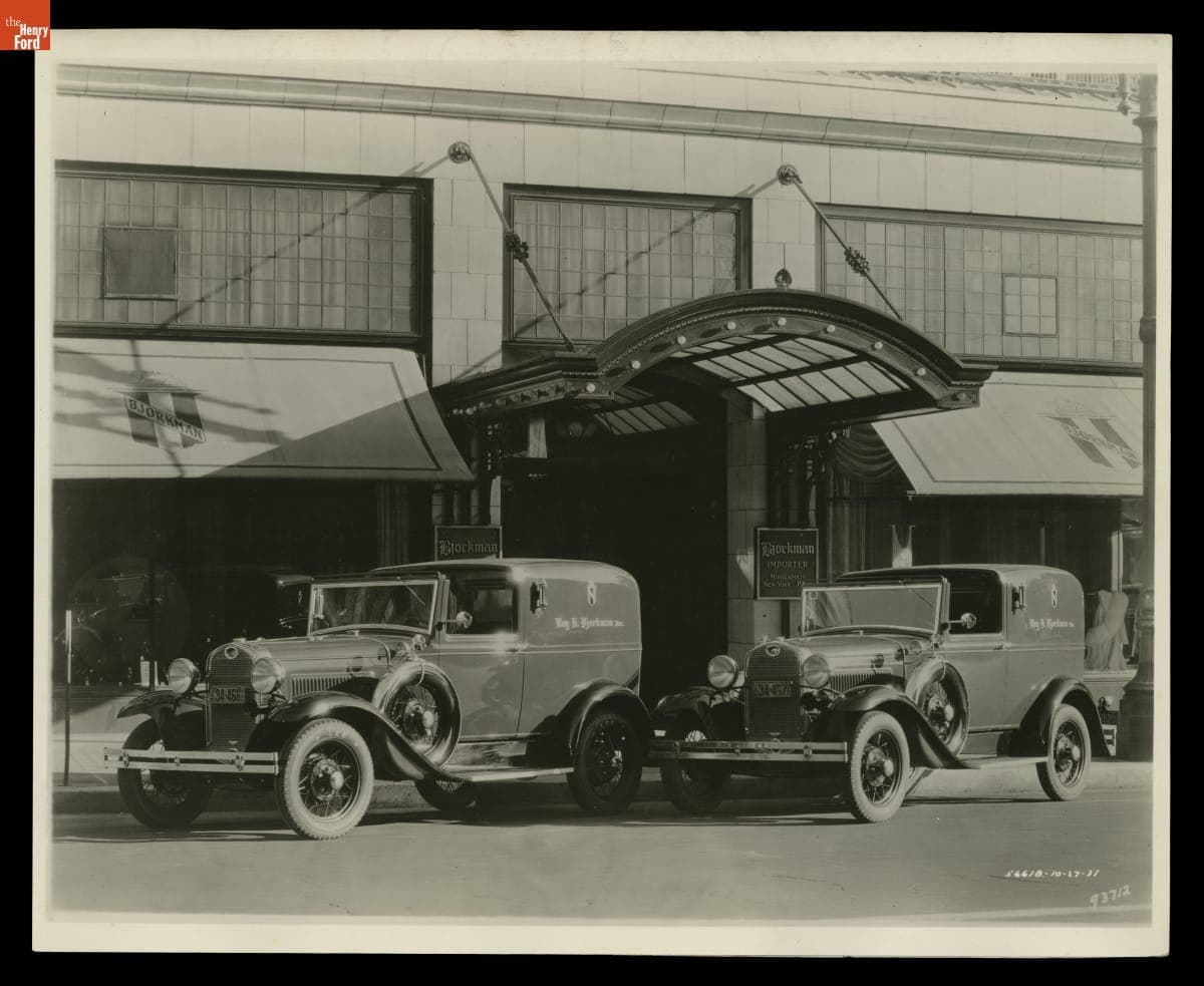 Ford Model A Town Car Delivery Trucks outside Roy H. Bjorkman Clothing Store, Minneapolis, Minnesota, 1931