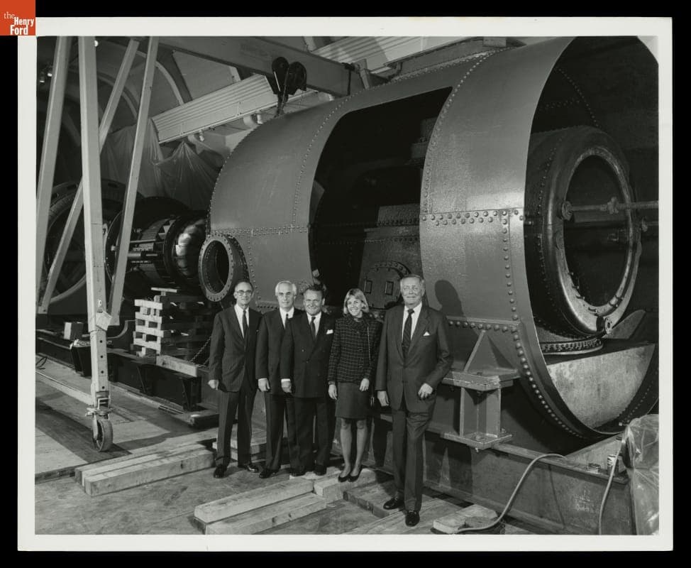 Members of Edison Institute Board of Trustees with Water Turbine Generator in Henry Ford Museum, December 1991