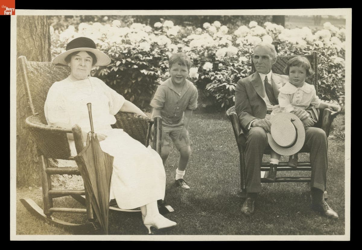 Clara Ford, Henry Ford II, Henry Ford, and Benson Ford in the Peony Garden at Fair Lane, Dearborn, Michigan, 1923
