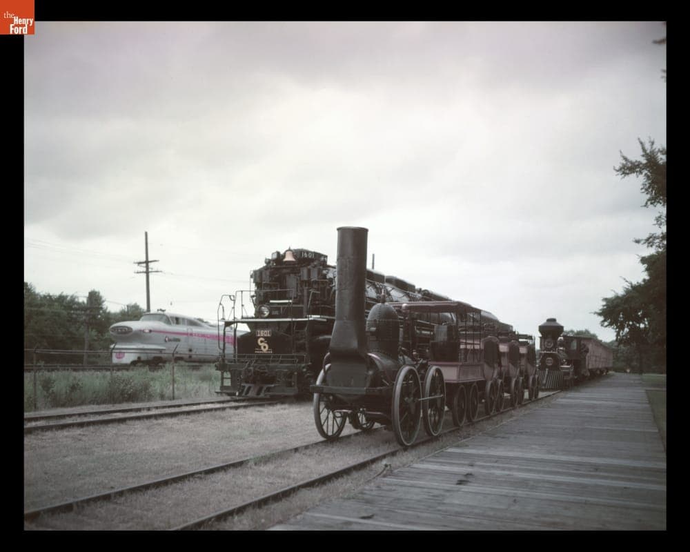 "Allegheny," "DeWitt Clinton," and "Sam Hill" Locomotives Alongside New York Central Diesel Aerotrain, circa 1956