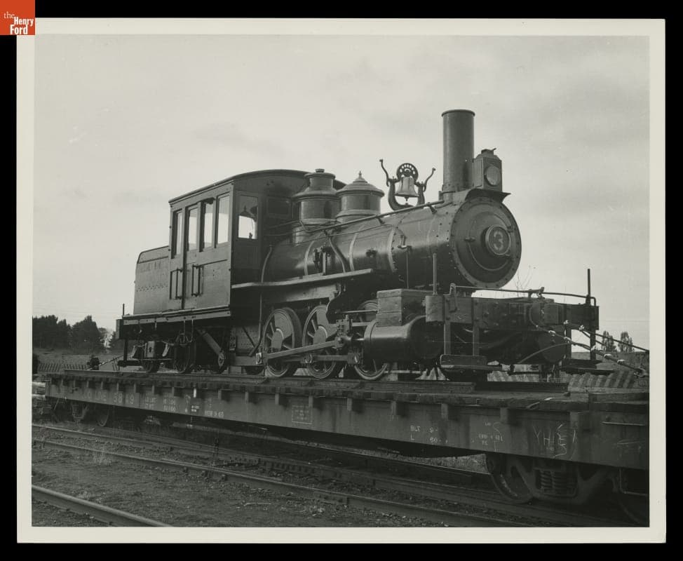 Torch Lake Steam Locomotive Loaded on a Flatcar for Transport from Ahmeek Mine near Calumet, Michigan, November 1969
