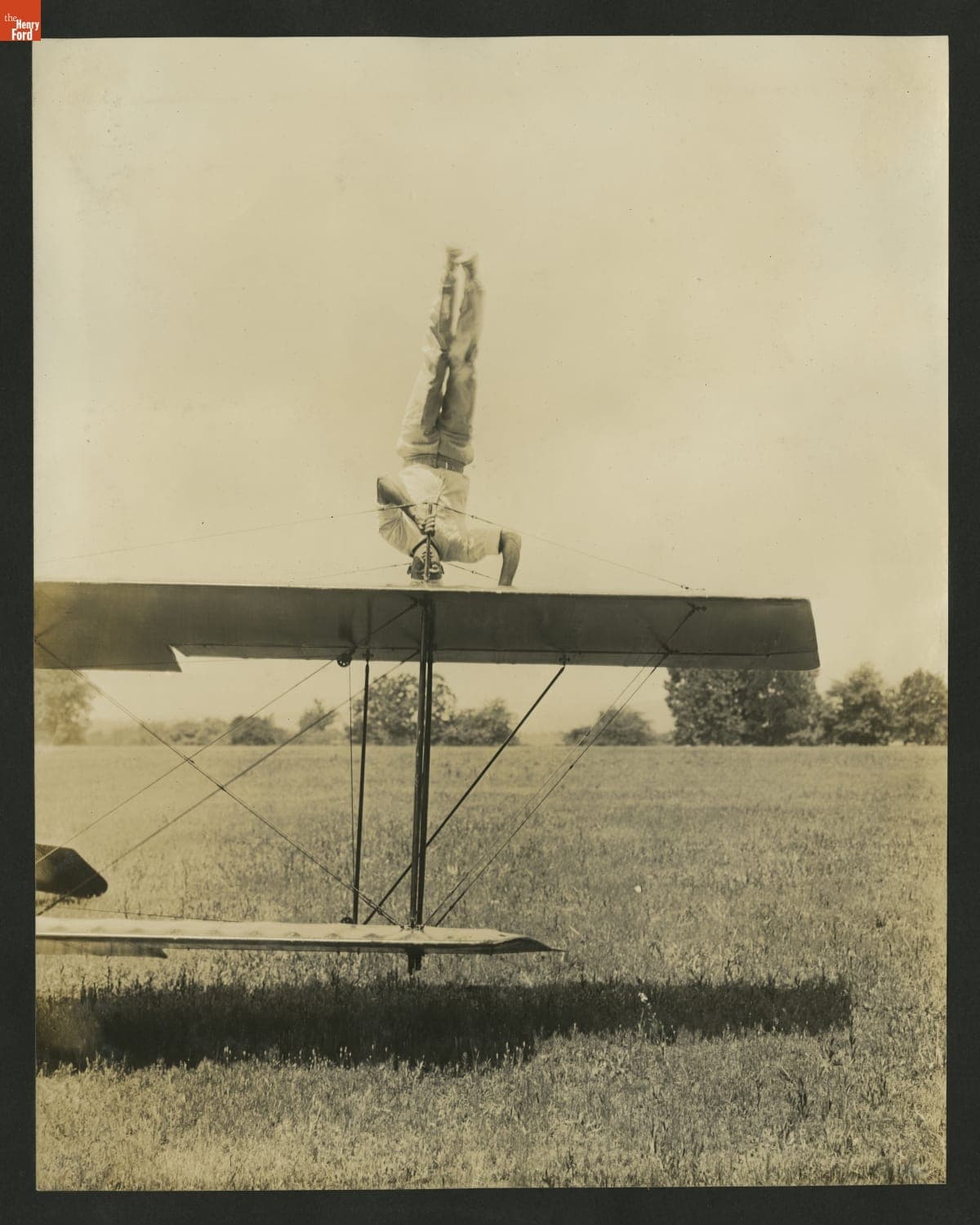 "Jersey" Ringel Demonstrating a Stunt on an Airplane Wing, circa 1921