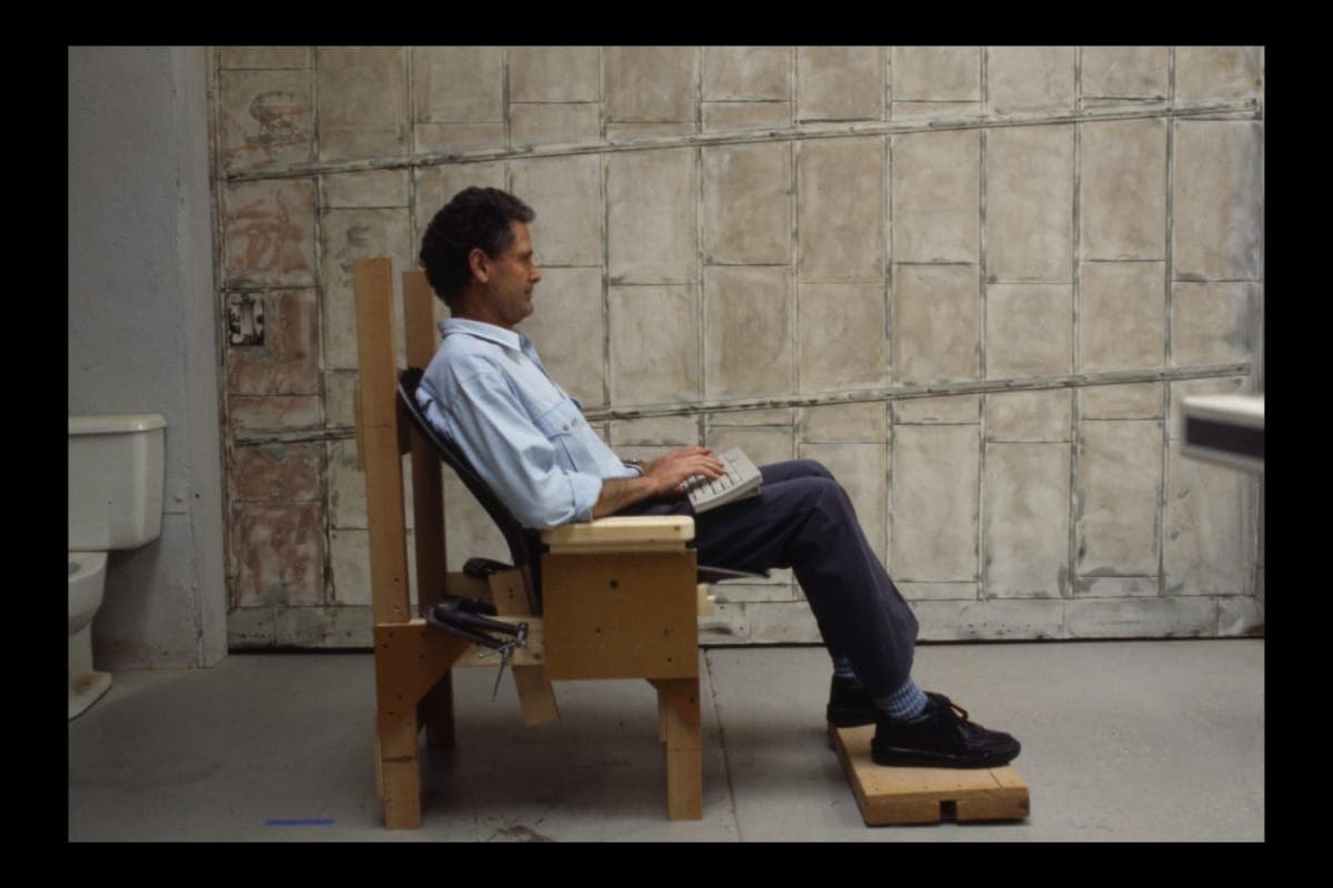 Don Chadwick Testing a Chair Prototype, circa 1993