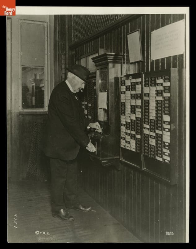 Thomas Edison Punching the Time Clock on His 74th Birthday, February 11, 1921