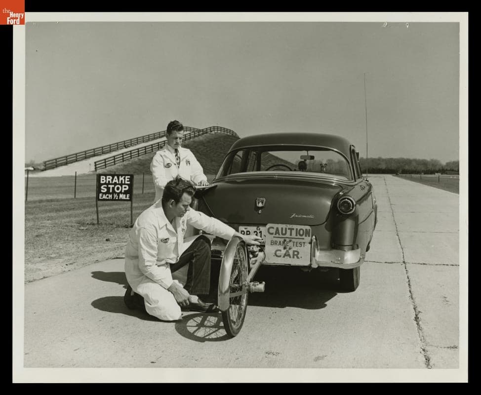 Attaching "Fifth Wheel" Testing Device at Ford Test Track, Dearborn, Michigan, 1952
