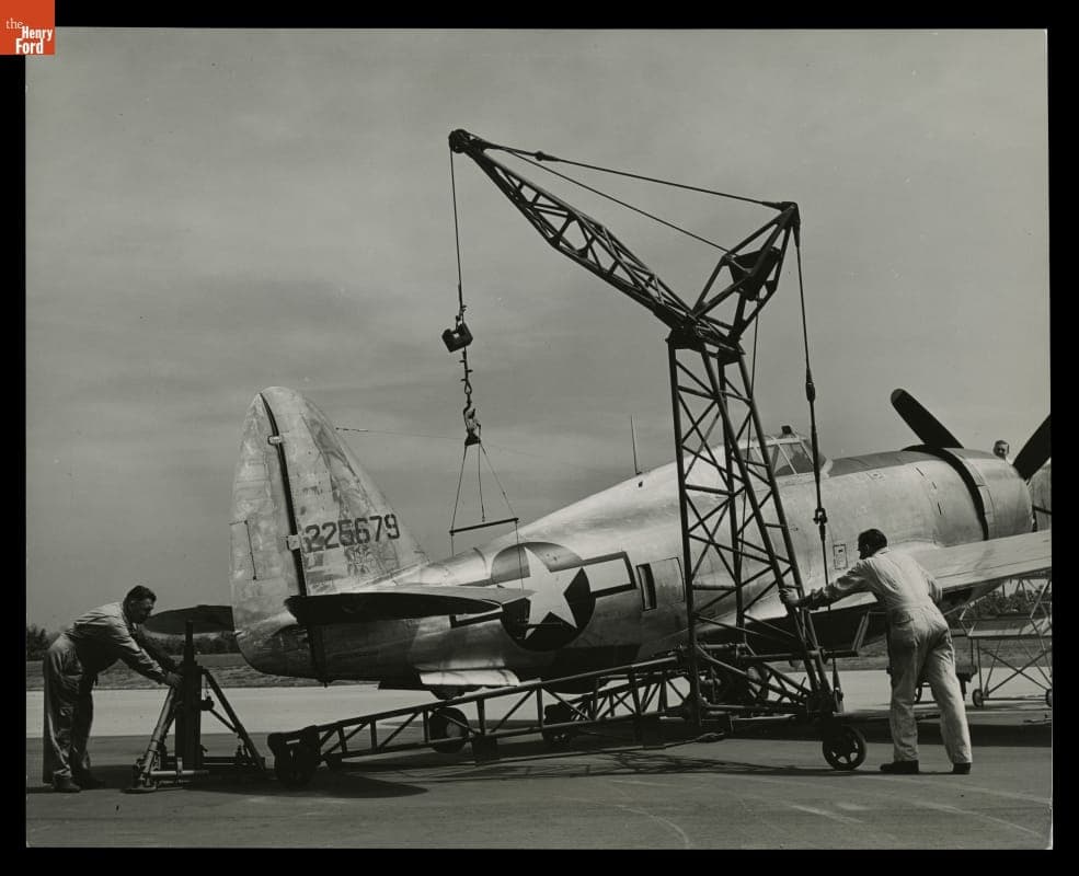 Maintenance Crew Switching Out Engine On P-47 Thunderbolt