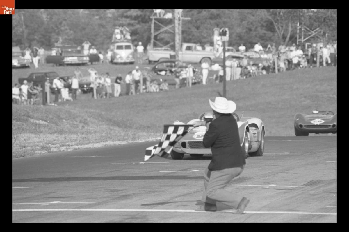 McLaren Elva Mark II Driven by Lothar Motschenbacher Crossing Finish Line at the United States Road Racing Championship "Buckeye Cup" Race, Mid-Ohio Course, August 1966