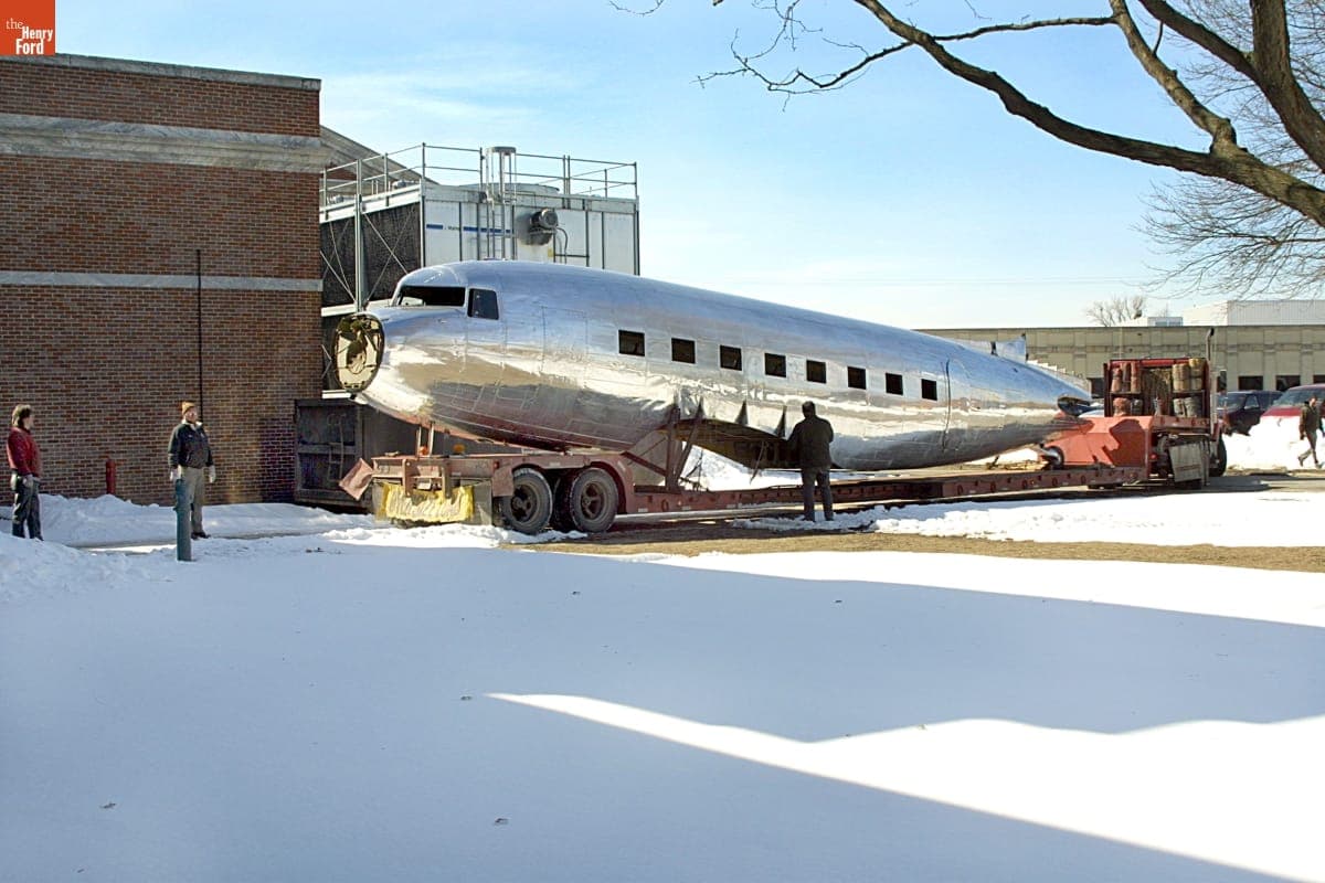 Installing the 1939 Douglas DC-3 Airplane into Heroes of the Sky Exhibit in Henry Ford Museum, March 2003