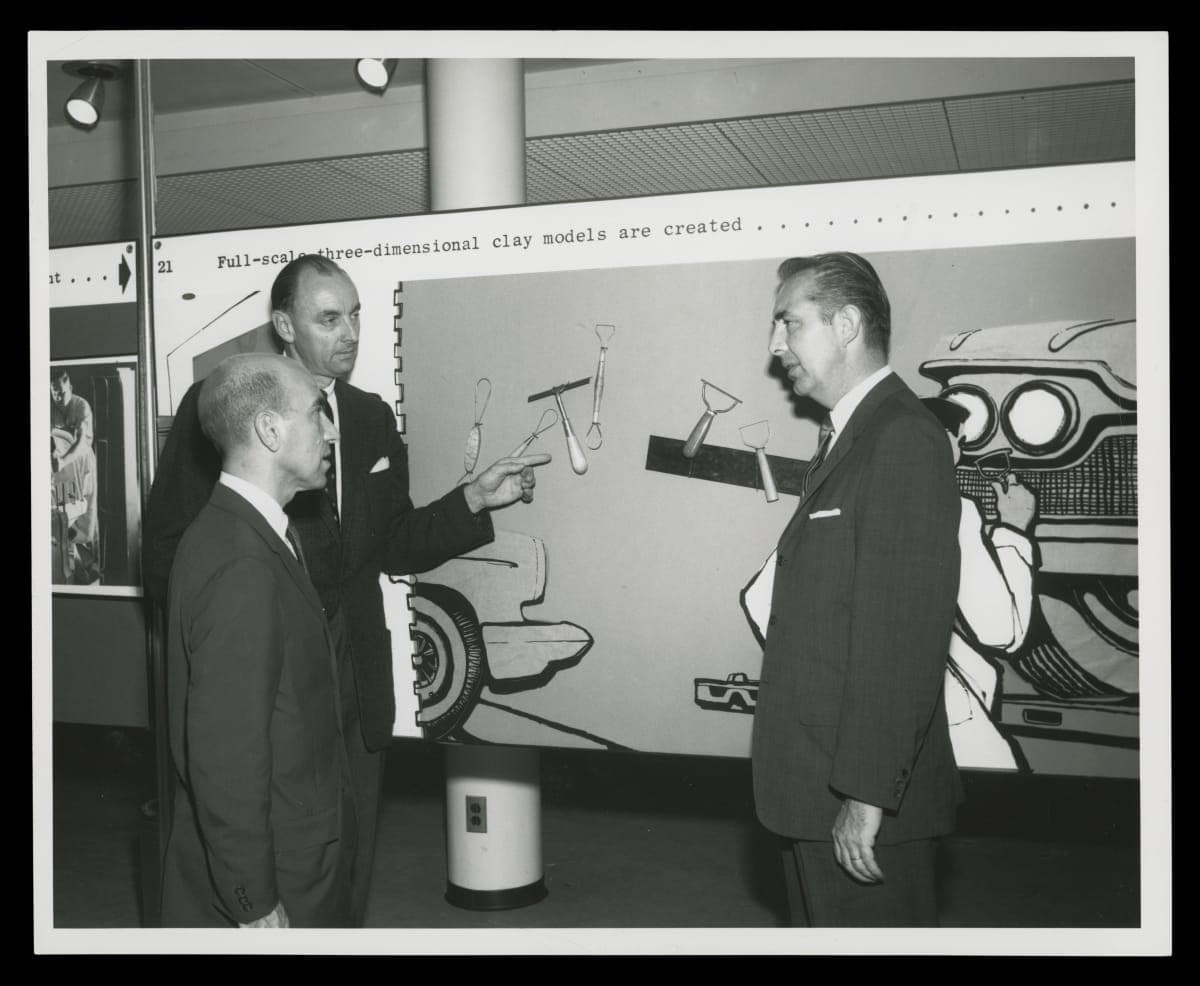 Eugene Bordinat, Elwood P. Engel, and John Najjar at Wayne State University Exhibit, 1961