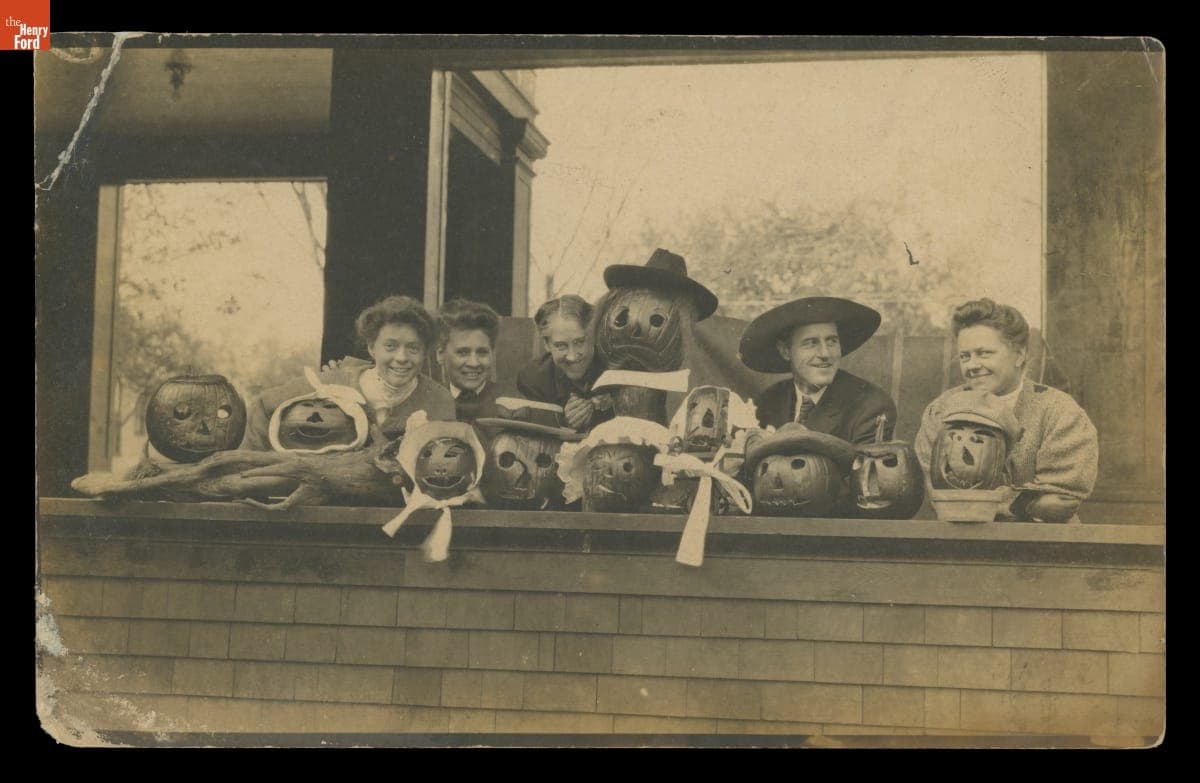 Photographic Postcard Showing Young Adults Celebrating Halloween with Carved Jack-O-Lanterns, 1907