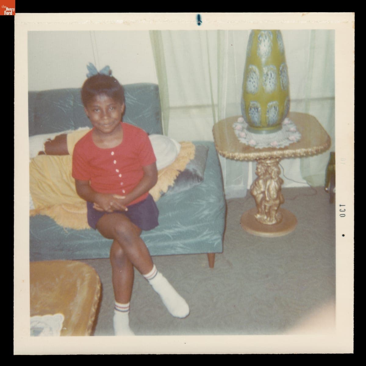 Girl Sitting on a Sofa, October 1970
