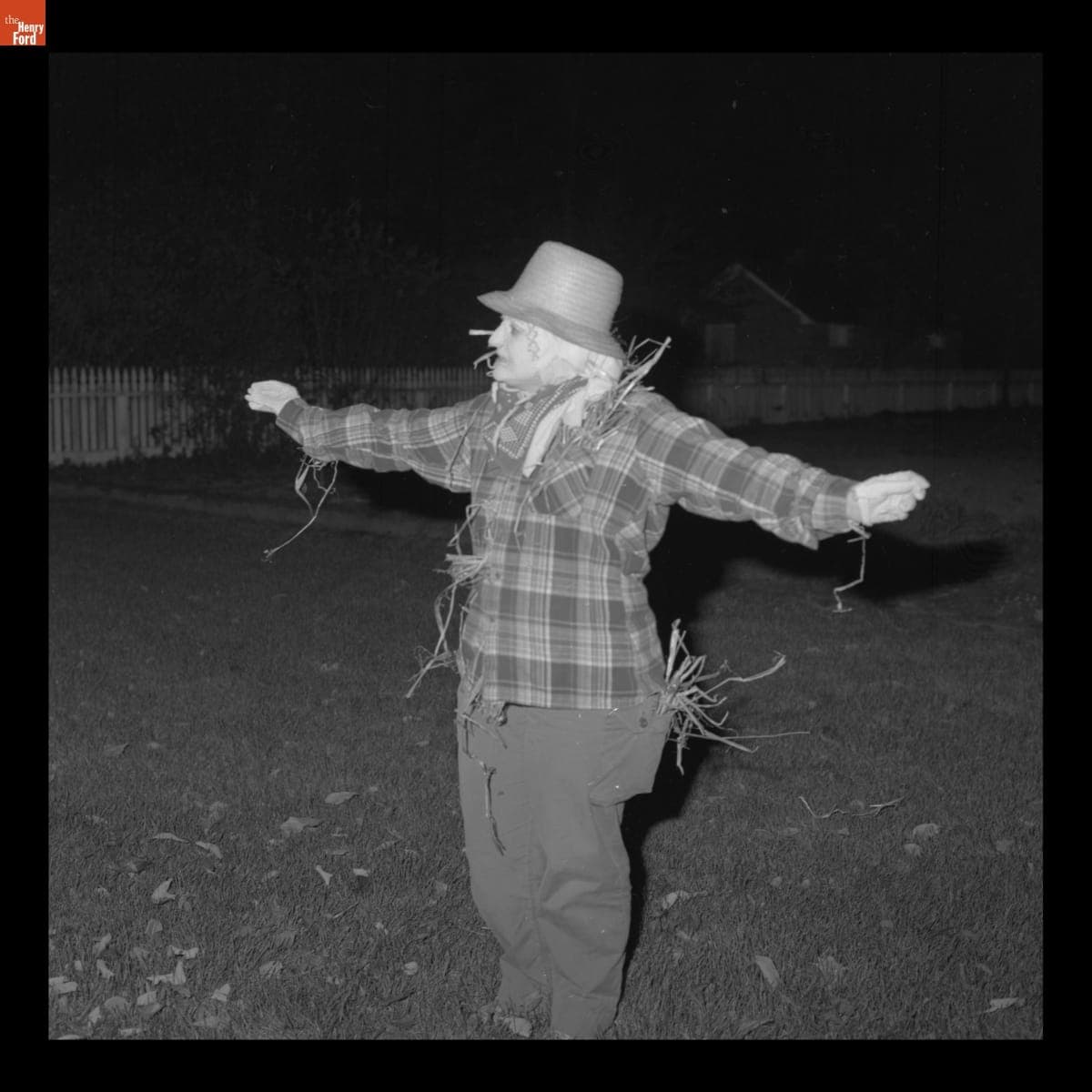 "Scarecrow" by Sarah Jordan Boarding House during Halloween in Greenfield Village, October 1982