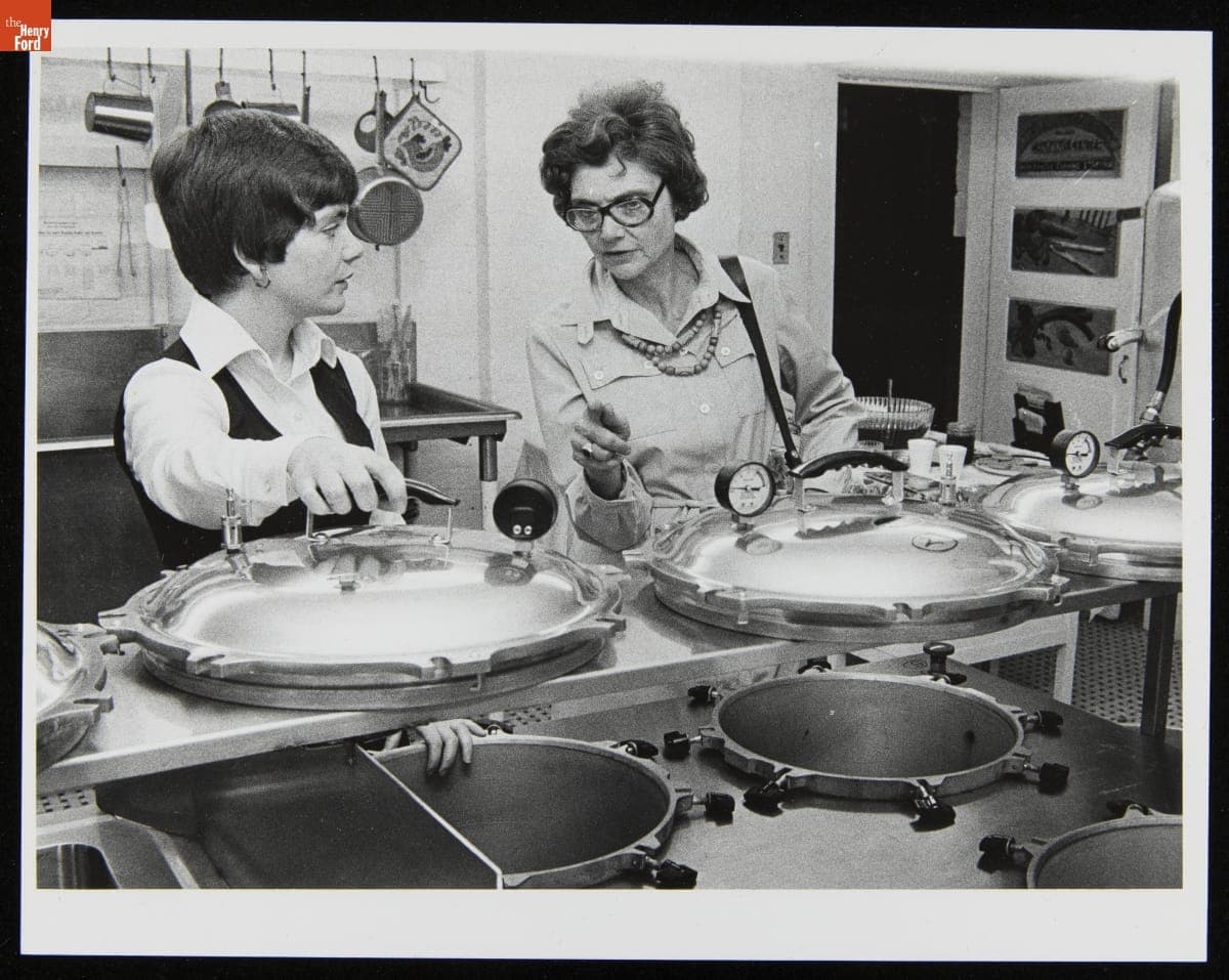 Pat Marsolais, Head of a Community Canning Center, Explains the Operation to Barbara Meffert, June 1980