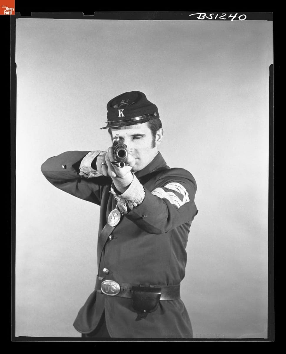 Rudy Ruzicska Posing for Muzzle Loaders Festival Promotional Materials, 1969