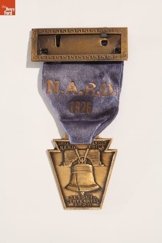 Sesqui-Centennial International Exposition National Association of Retail Druggists Badge, 1926