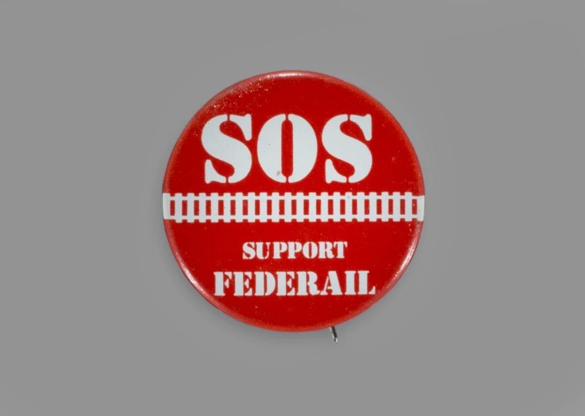 Button, "SOS Support FedeRail," circa 1973