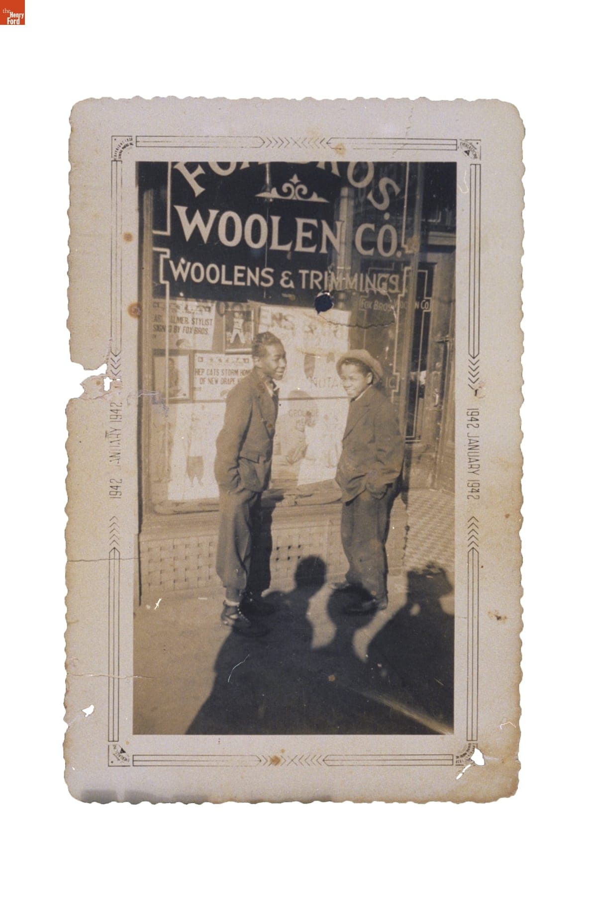 Two Boys Wearing Zoot Suits outside Fox Brothers Clothier, Chicago, Illinois, January 1942