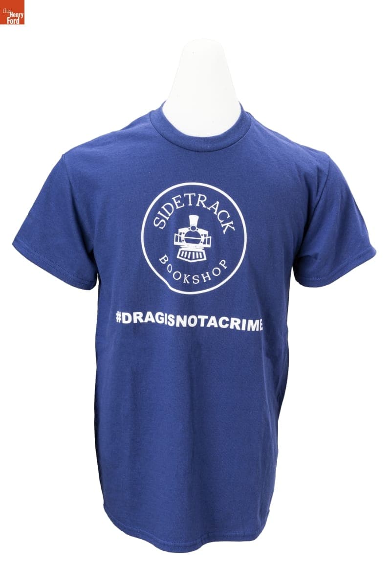 "Sidetrack Bookshop #DRAGISNOTACRIME" T-Shirt, 2023