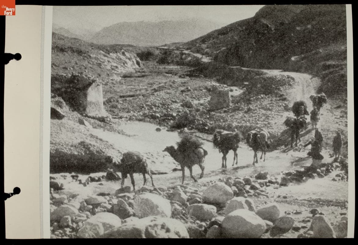 Camel Pack Train Crossing a Stream on a Stone Road, 1934