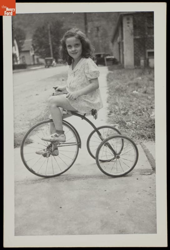 Girl on a Tricycle, circa 1940